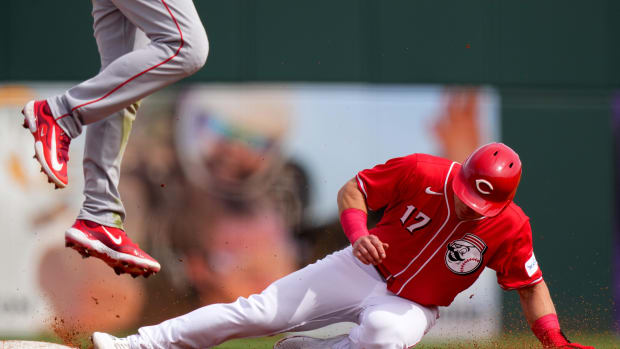 Feb 25, 2024; Goodyear, Ariz USA; Cincinnati Reds left fielder Stuart Fairchild (17) steals second base in the third inning during a MLB spring training baseball game against the Los Angeles Angels at Goodyear Ballpark. Mandatory Credit: Kareem Elgazzar-USA TODAY Sports via The Cincinnati Enquirer  